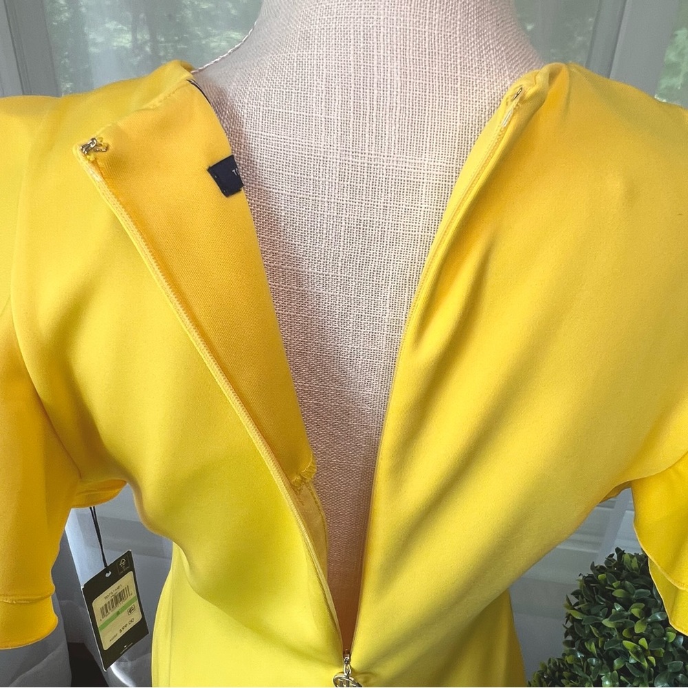 Tommy Hilfiger Scuba Crew Neck Flutter Ruffle Cap Sleeve Dress
Yellow Size 8 NWT - Picture 6 of 16